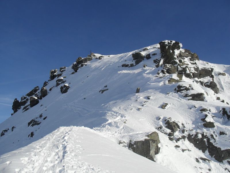juste avant le sommet : et avant de mettre les skis sur le dos.